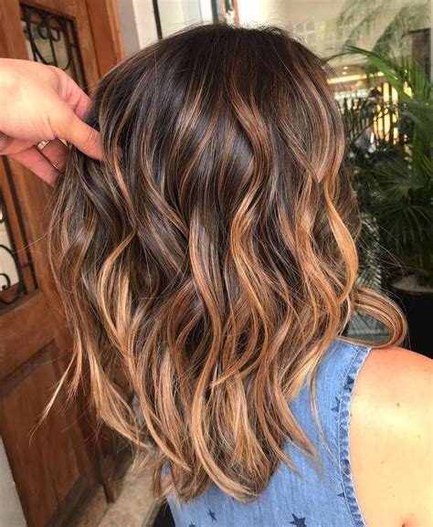 caramel foils on dark brown hair|caramel highlights on dark brown hair.